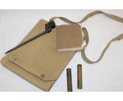 A Second War Officers webbing map case dated 1944, MKII spike bayonet, two brass oil bottles and a small arms manual 