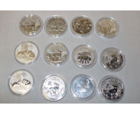 Twelve silver 1oz coins depicting Chinese New Year animals 