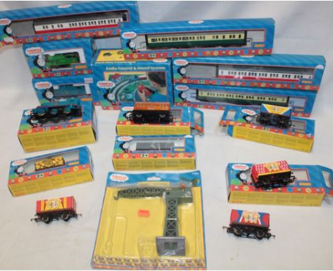 A selection of Hornby 00 gauge Thomas the Tank Engine railway including three boxed trains, radio and control sound system, c