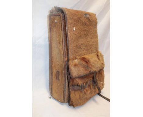 A Second War German Army cowhide and leather backpack by Fritz Hohner dated 1944 