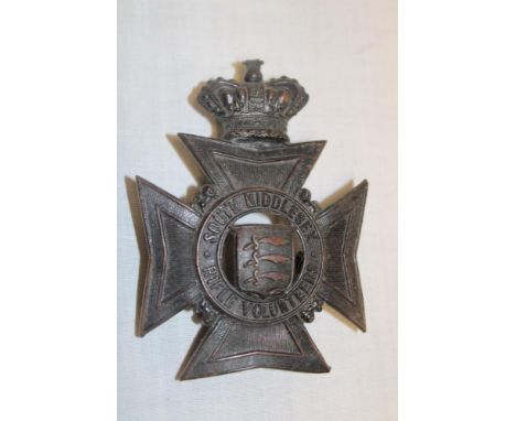 An original Victorian blackened brass helmet plate of South Middlesex Rifle Volunteers 