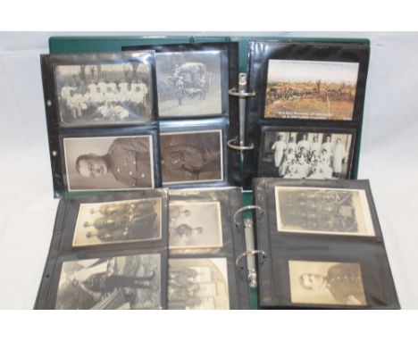 Two albums containing a collection of Royal Army Medical Corps related postcards including 12 embroidered silk First War post