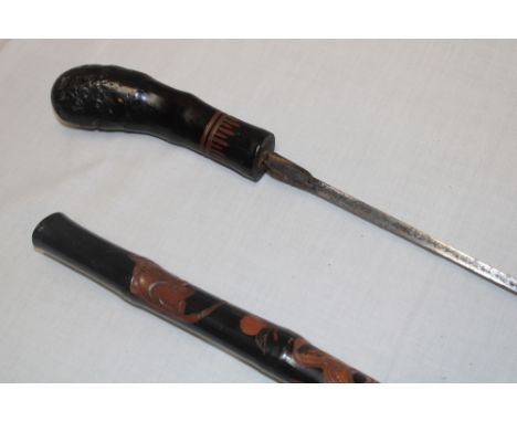 An old Eastern sword stick with 26½" square-section blade in carved bamboo mounts 