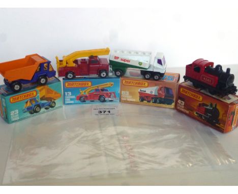 4 BOXED MATCHBOX VEHICLES - 13 SNORKEL FIRE ENGINE, 23 ATLAS TRUCK, 43 STEAM LOCOMOTIVE, 63 FREEWAY GAS TANKER