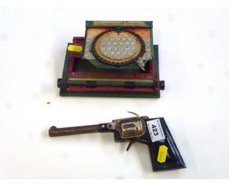CAPGUN AND A SIMPLEX TYPEWRITER