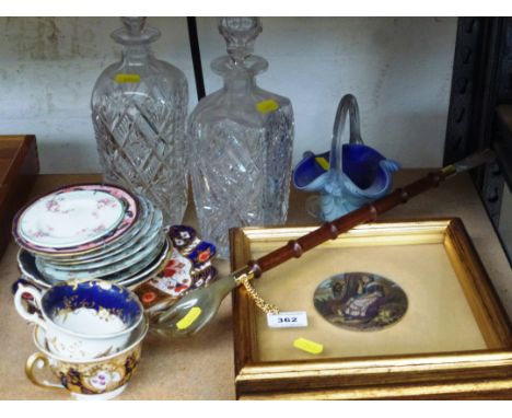 2 GLASS DECANTERS, GLASS BASKET, BACK SCRATCHER, FRAMED POT LID AND ASSORTED CUPS AND SAUCERS