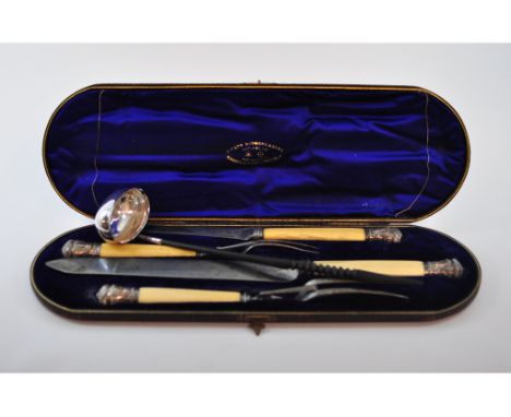 An Irish silver toddy ladle, Dublin 1970, a plated warming stand, a carving set and other items (box)