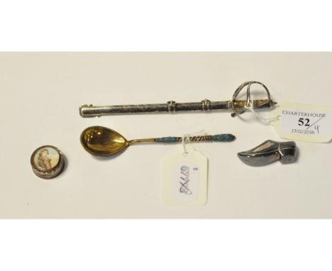 A Victorian silver novelty paper knife, in the form of a sword, with scabbard, 1895, a Russian silver gilt and enamel spoon, 