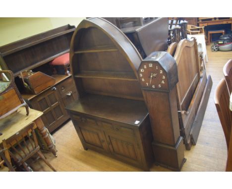 A nest of three occasional tables, an oak dresser, an oak gateleg table, a set of four kitchen chairs and a dwarf longcase cl