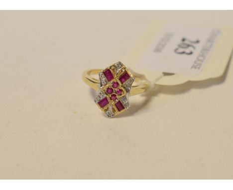 An Art Deco style 9ct gold, ruby and diamond three stone ring