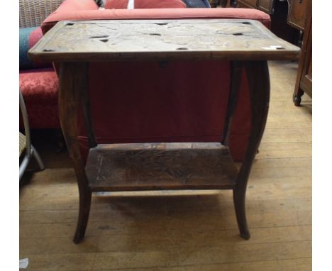 A Japanese carved two tier table, 75 cm wide, and a mahogany tripod table, with a shaped oval top, 79 cm wide (2)