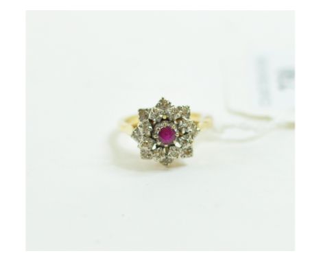 An 18ct gold, ruby and diamond flowerhead ring, approx. ring size N½