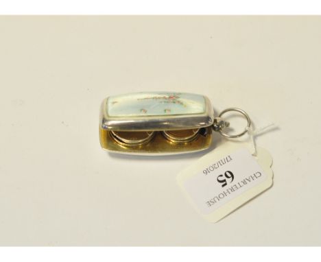 A Continental silver coloured metal, gilt and enamel double sovereign and half sovereign case (clasp a.f.)