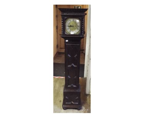 A 17th century style dwarf longcase clock, the 19.5 cm wide brass dial with a silvered chapter ring, fitted an 8 day movement