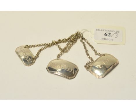 A George III silver decanter label, Gin, Birmingham 1817, and two others similar (3)