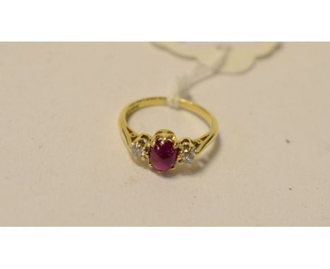 An 18ct gold, cabochon ruby and diamond ring, approx. ring size J