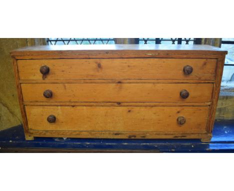 A pine chest, of three drawers, 110 cm wide, three blanket boxes, a travelling trunk, a painted milk churn and other items (q