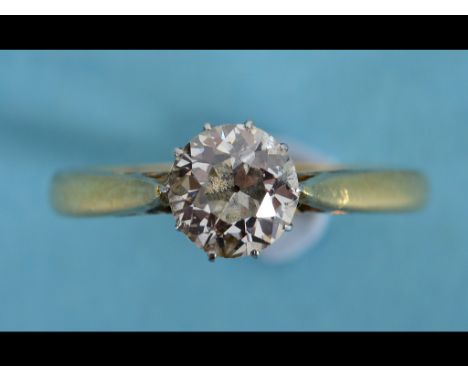 An 18ct gold and solitaire diamond ring, approx. ring size K½   See inside back cover colour illustration
