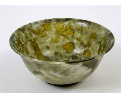 A mottled jade bowl, 12.5 cm diameter  See illustration