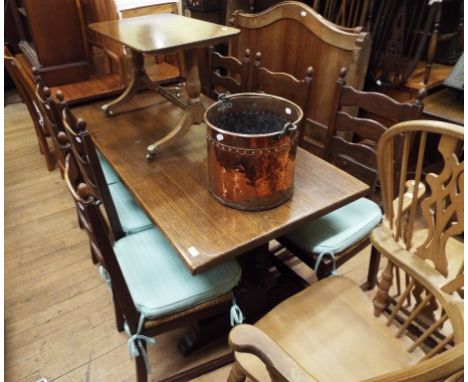 An oak refectory style dining table, 166 cm wide, a set of six ladder back dining chairs, a coffee table, and a copper bucket