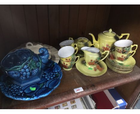 Shelf of pottery and teaware 