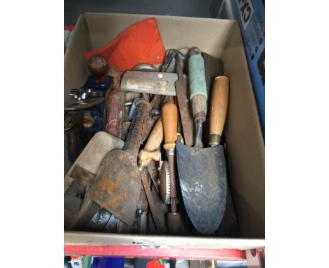 A box of old tools including a Record plane 