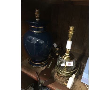 Two lamps and a barometer 