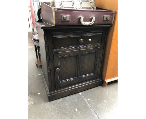 An Ercol cabinet 