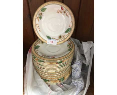 A bag containing Royal Doulton saucers 