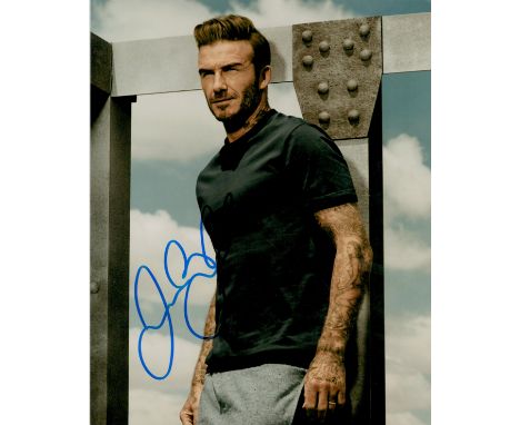 David Beckham signed 10x8inch colour photo. Good condition. All autographs come with a Certificate of Authenticity. We combin