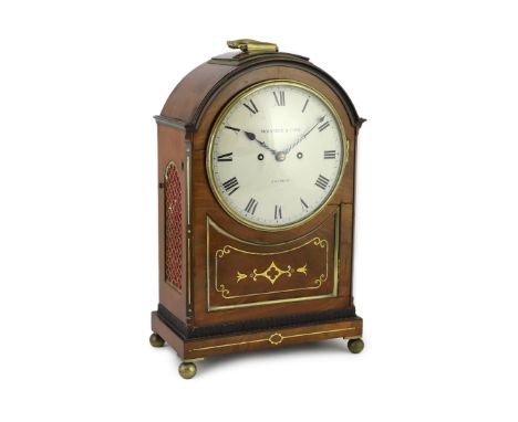 Molyneux &amp; Cope of London. A Regency brass inset repeating bracket clock, with enamelled Roman dial and brass inset arche