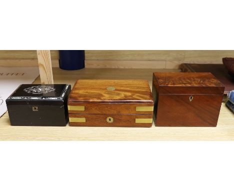 A Victorian mahogany brass bound sewing box, a mother of pearl and silver metal inlaid ebony tea caddy and another caddy,Ebon