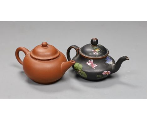 Two Chinese Yixing miniature teapot and a Wedgwood enamelled black basalt miniature teapot, 6cm high,