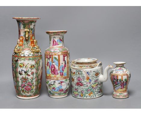 Three Chinese famille rose vases and a teapot, late 19th/early 20th century, tallest vase 29.5 cms high,