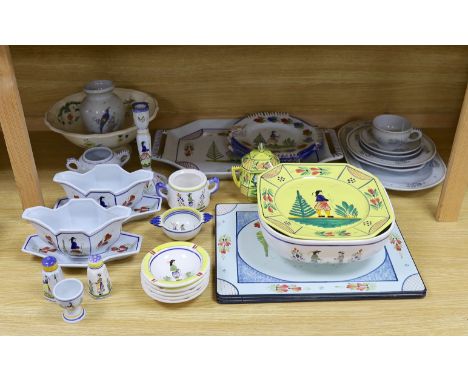 A collection of French Quimper tablewares,