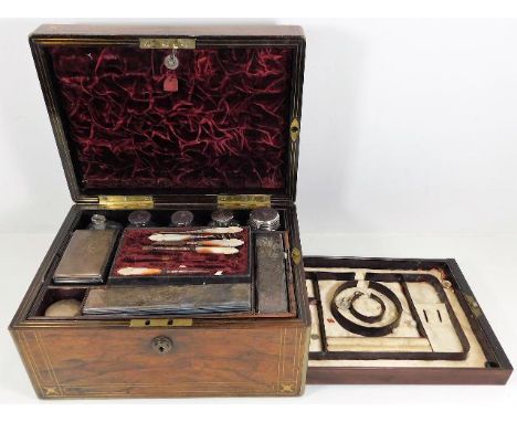 A 19thC. velvet lined rosewood ladies vanity box with silver topped tidies &amp; silk lined secret jewellery tray under