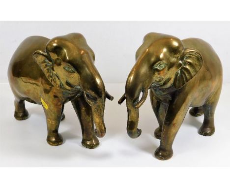 A vintage pair of brass elephants