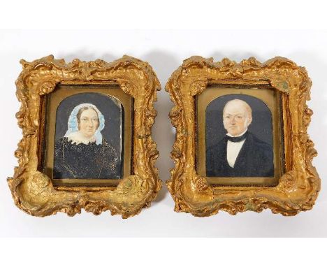 A 19thC. English school portrait miniature watercolours of husband &amp; wife set within gilt frames