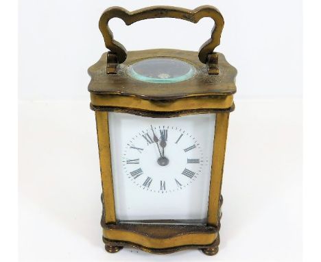 A brass carriage clock 5.25in high