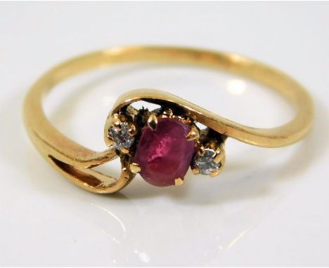 A yellow metal ring, tests as 18ct gold, set with ruby &amp; diamond 1.4g size J