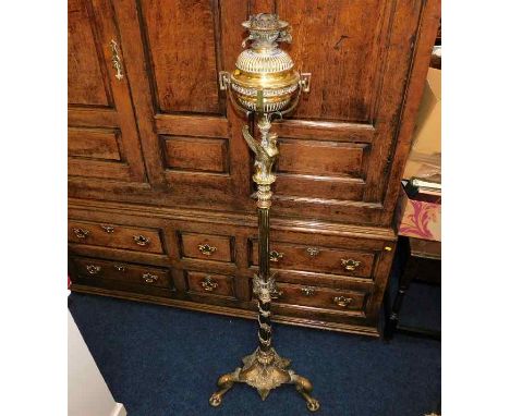 A 19thC. ornate brass rise &amp; fall lamp 63in tall 87in fully extended. Provenance: From Trematon Hall, Saltash