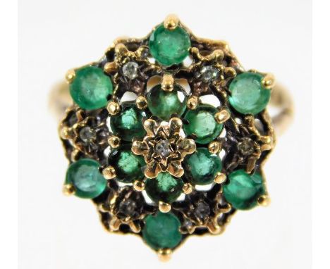 A 9ct gold ring set with green &amp; white stones 2.8g size K