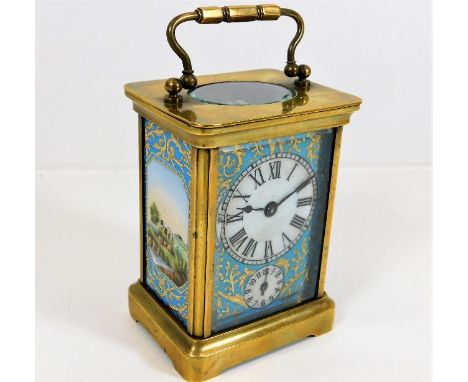 A French brass carriage clock with Sevres style porcelain panels 5.5in high