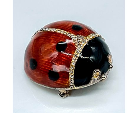 The Metropolitan Museum of Art offers a stunning Sterling Silver Enamel Ladybug Brooch/Pendant. This exquisite piece showcase