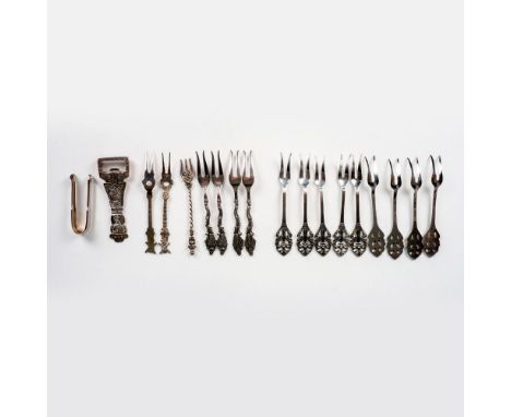 Includes a set of 9 floral forks, 4 dancing maiden forks, 2 windmill forks, 1 horn player fork, 1 Peruvian bottle opener, and