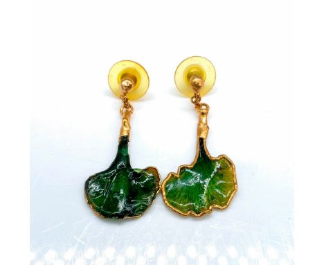 Gold metal earrings with green enamel leaves. Dimensions: 1.75"L x 0.75"WCondition: Age related wear.