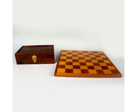 Includes gold-tone pewter and silver-tone pewter chess pieces with wooden protective box. Includes large wooden board. Board 