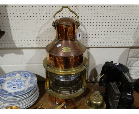 A Brass and Copper Mast Head Lamp by Harvie Of Glasgow