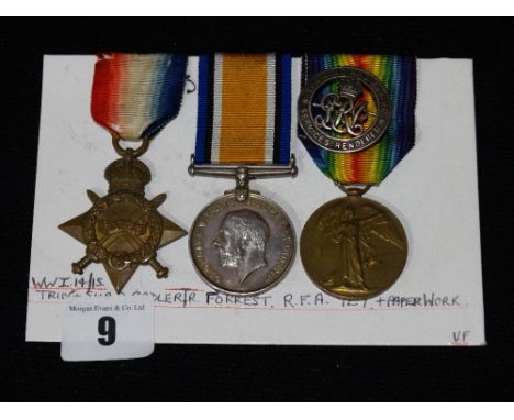 A 1st World War Trio Of 14-15 Star, War & Victory Medals Together with Badge, Awarded to Sadler R. Forest RFA, 927 Together w