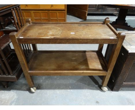 A Robert ‘The Mouseman’ Thompson Oak Two Tier Tea Trolley With Typical Carved Mouse